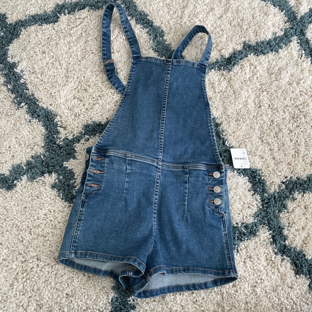 New Free People denim romper size 26 with tags attached!
